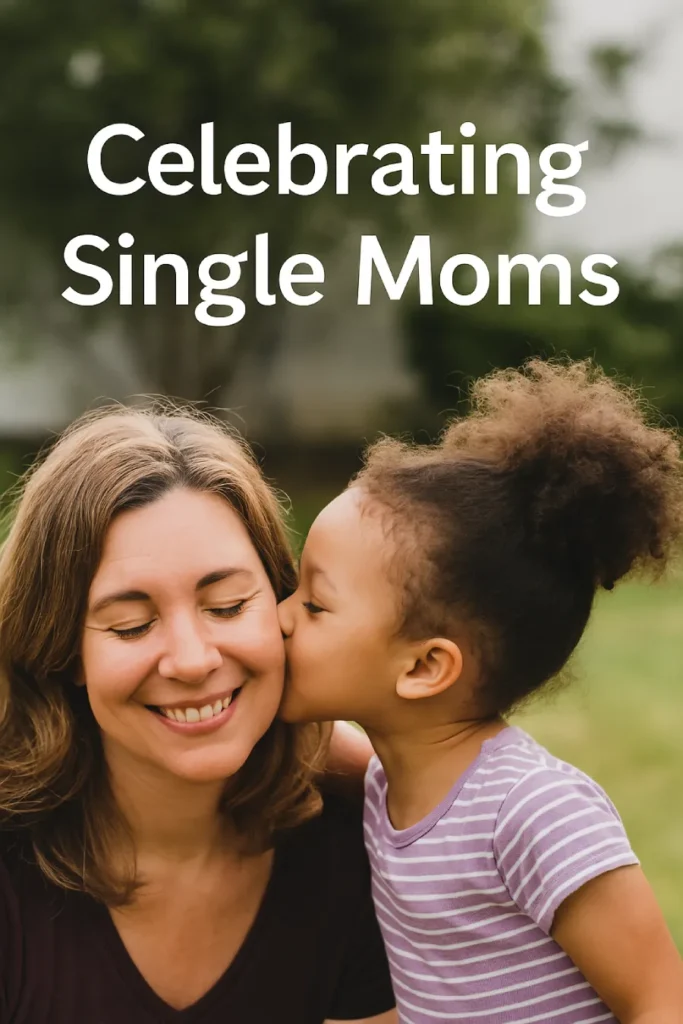 A young girl kissing her smiling single mother on the cheek in a sunny park, with the text “Celebrating Single Moms” overlaid.
